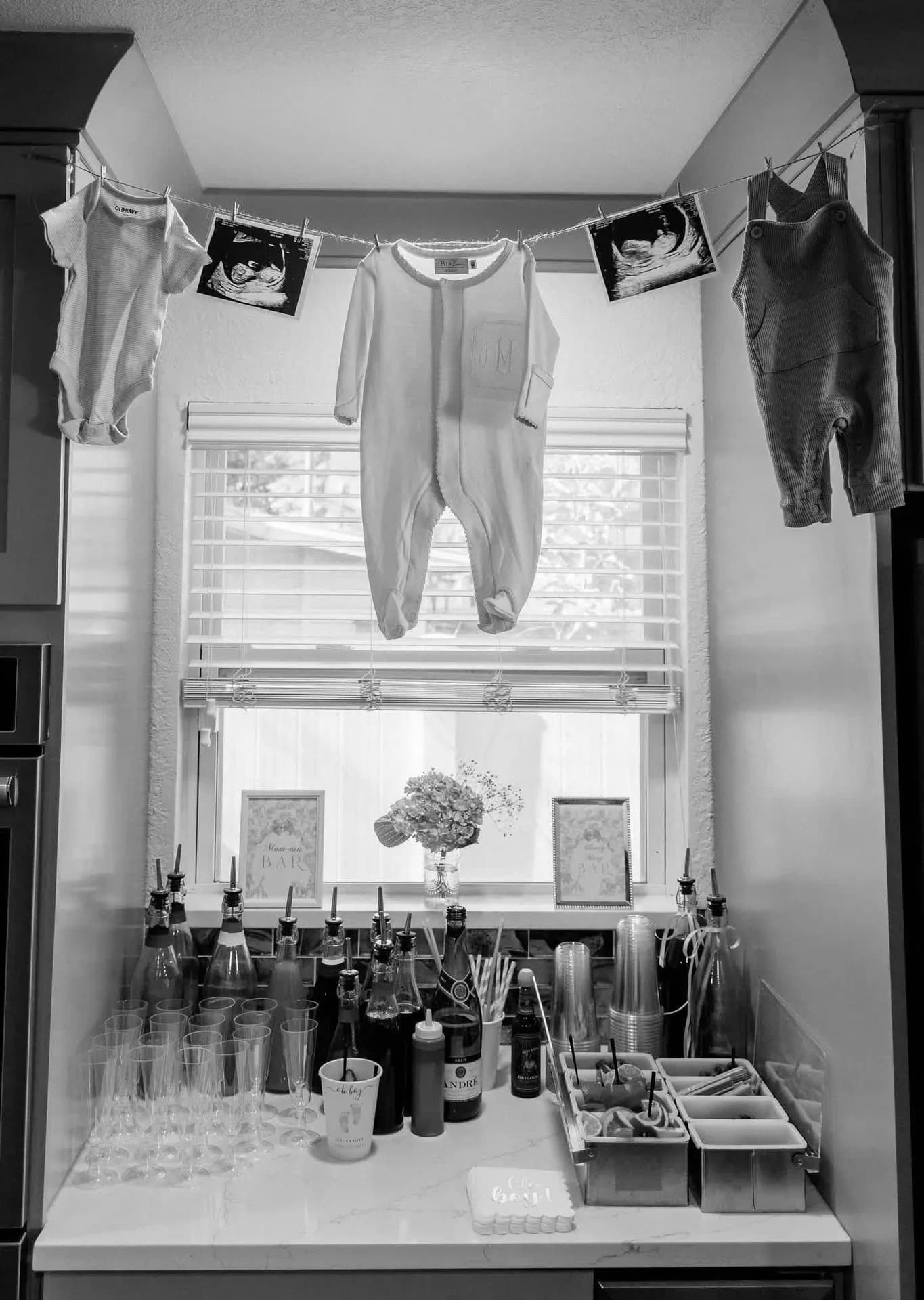 Batch cocktail bar setup for a baby shower celebration