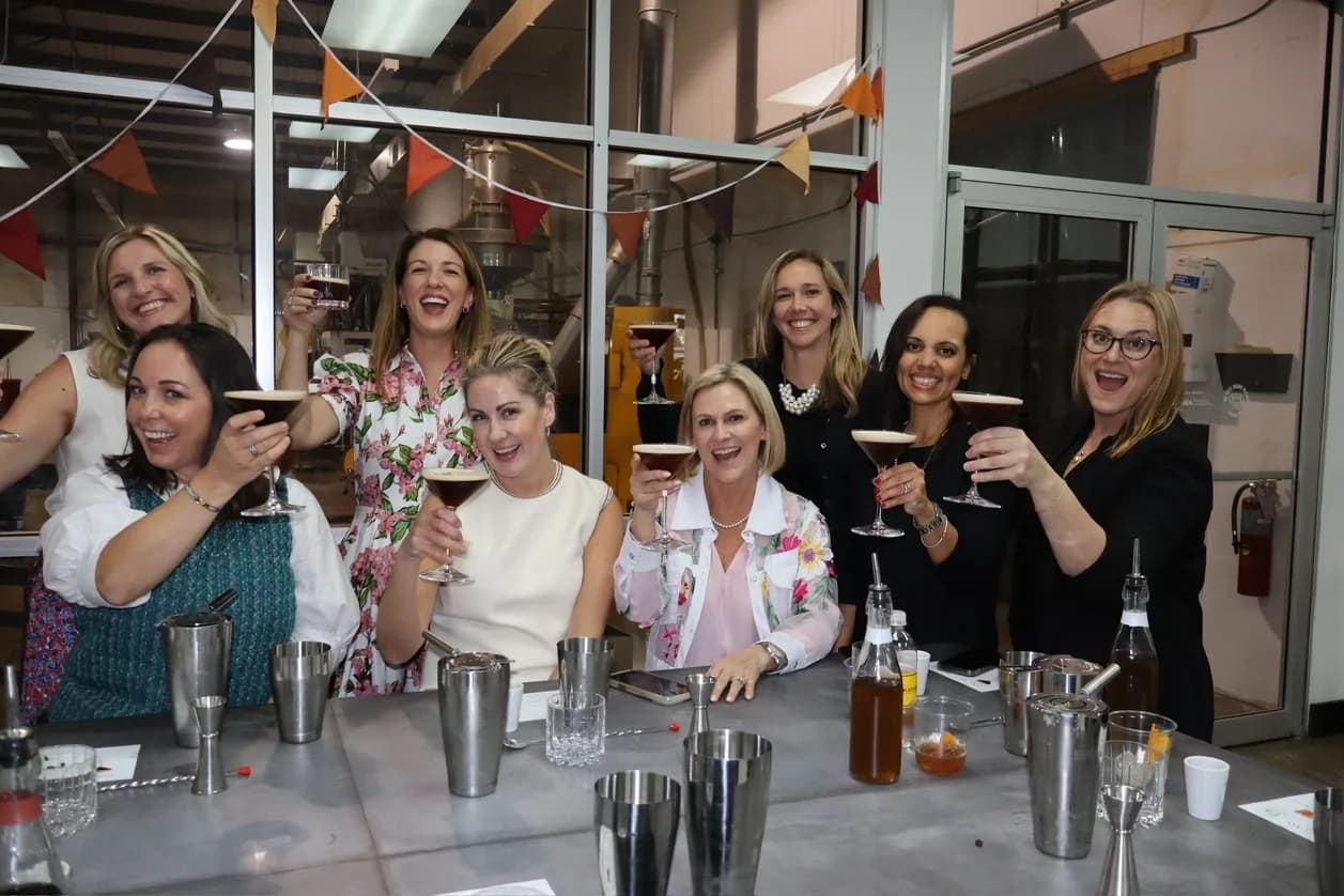 Group at a cocktail class holding espresso martinis
