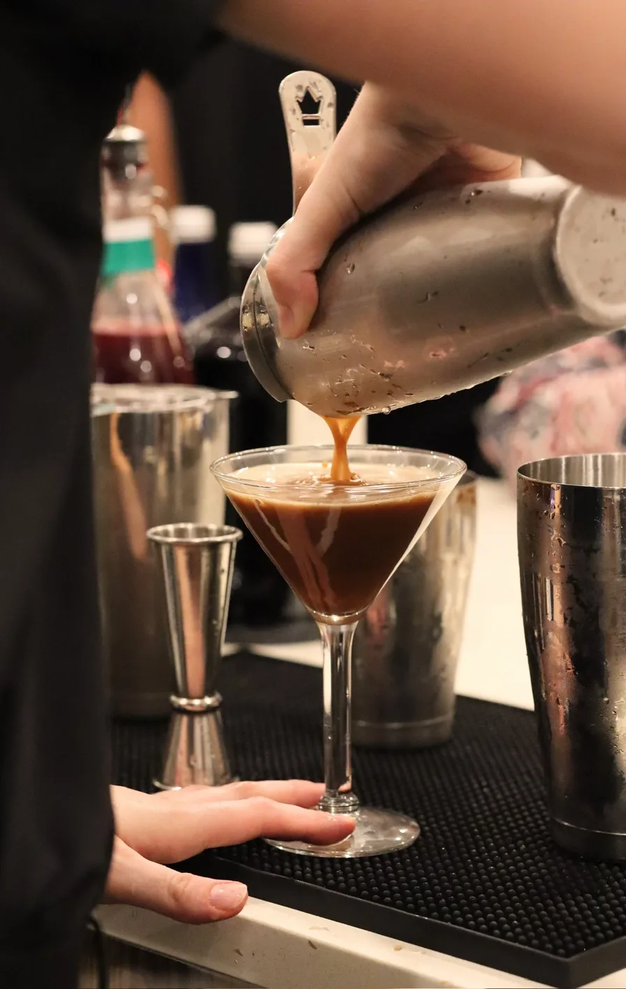 Bartender pouring an espresso martini