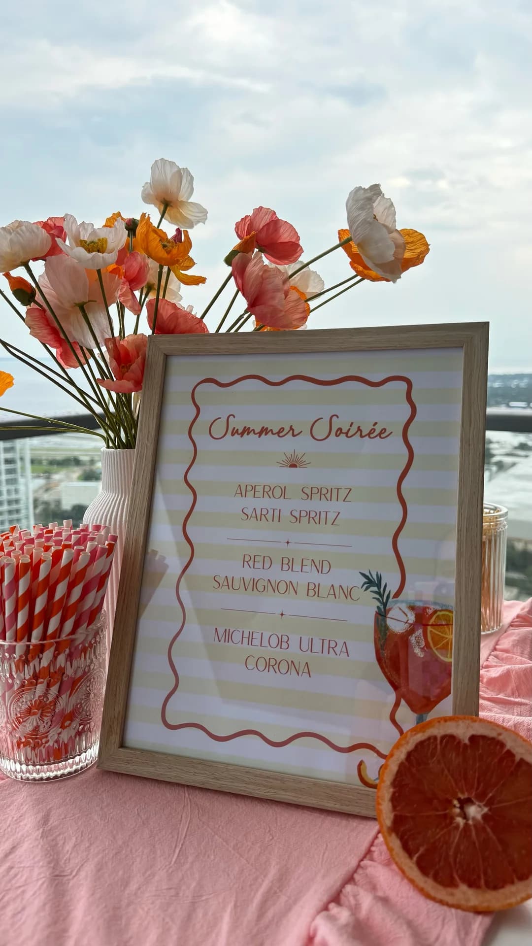 Framed Summer Soirée cocktail menu with poppies and striped straws