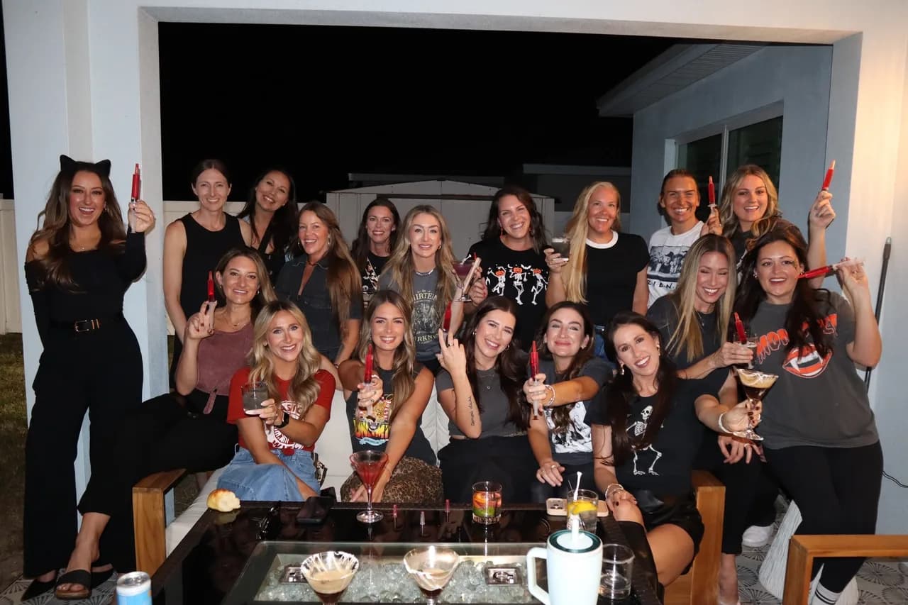 Large group at a Halloween cocktail party at night